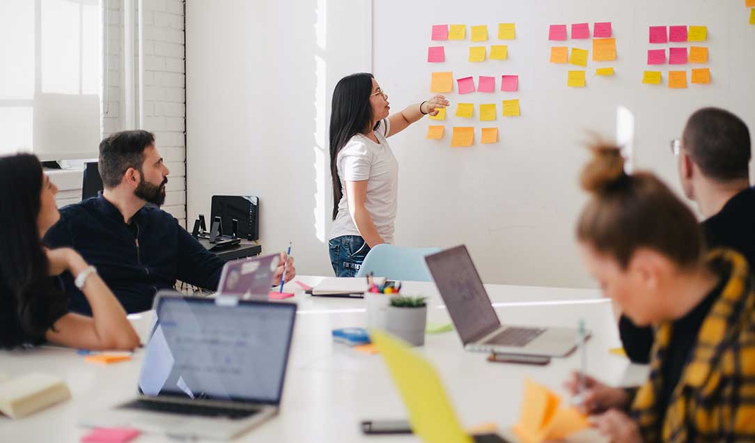 A diverse team holding a workshop