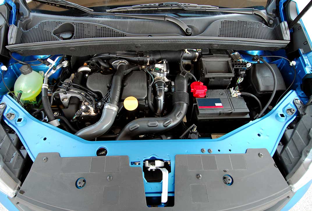 The open hood of a car.