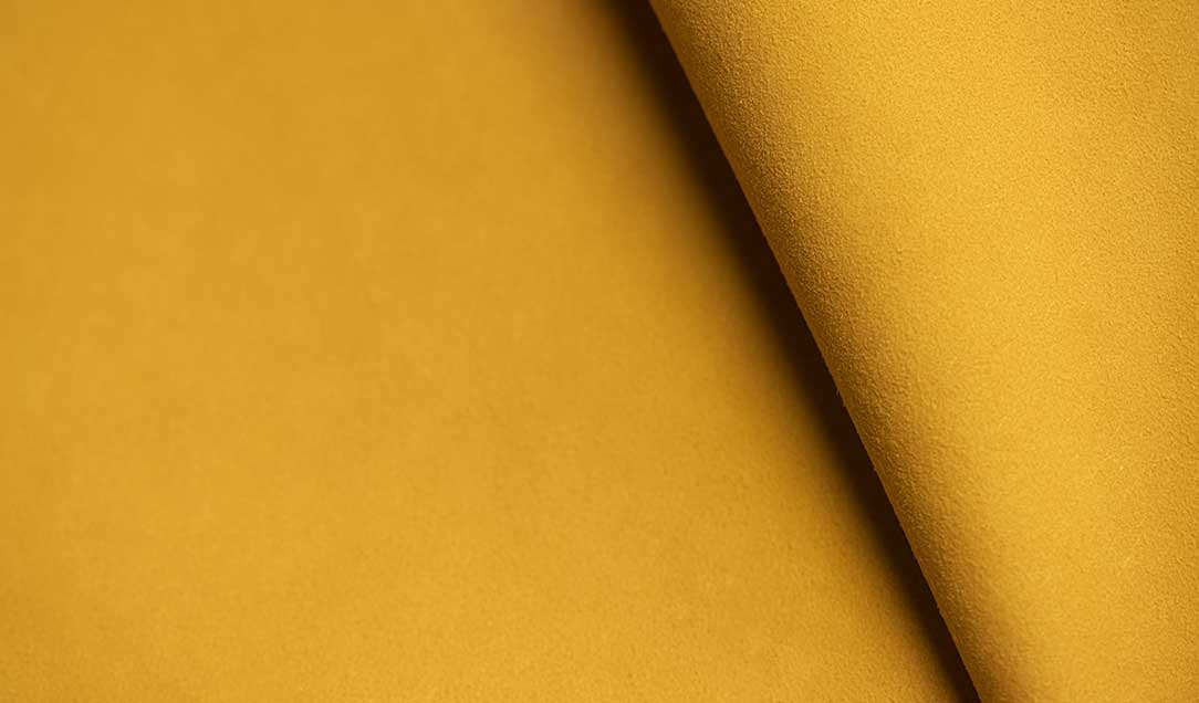 Brighten Your Designs with Polyester-Based Clarino™ Suede in Vibrant Colors  Elevate your projects with our polyester-based man-made leather, available in a dazzling array of bright, vibrant colors. This high-quality synthetic material seamlessly combines durability with a striking appearance, making it ideal for a wide range of applications. Perfect for linings, footwear, decorative purposes, and electronics molding, our polyester-based leather offers both versatility and style.  Whether you're designing cutting-edge fashion, innovative footwear, stylish home decor, or high-tech electronic casings, this material brings your visions to life. With its extensive palette of vibrant colors, you can find the perfect shade to complement any project. Experience the durability and brilliance of our polyester-based man-made leather and infuse your designs with a touch of color and innovation.