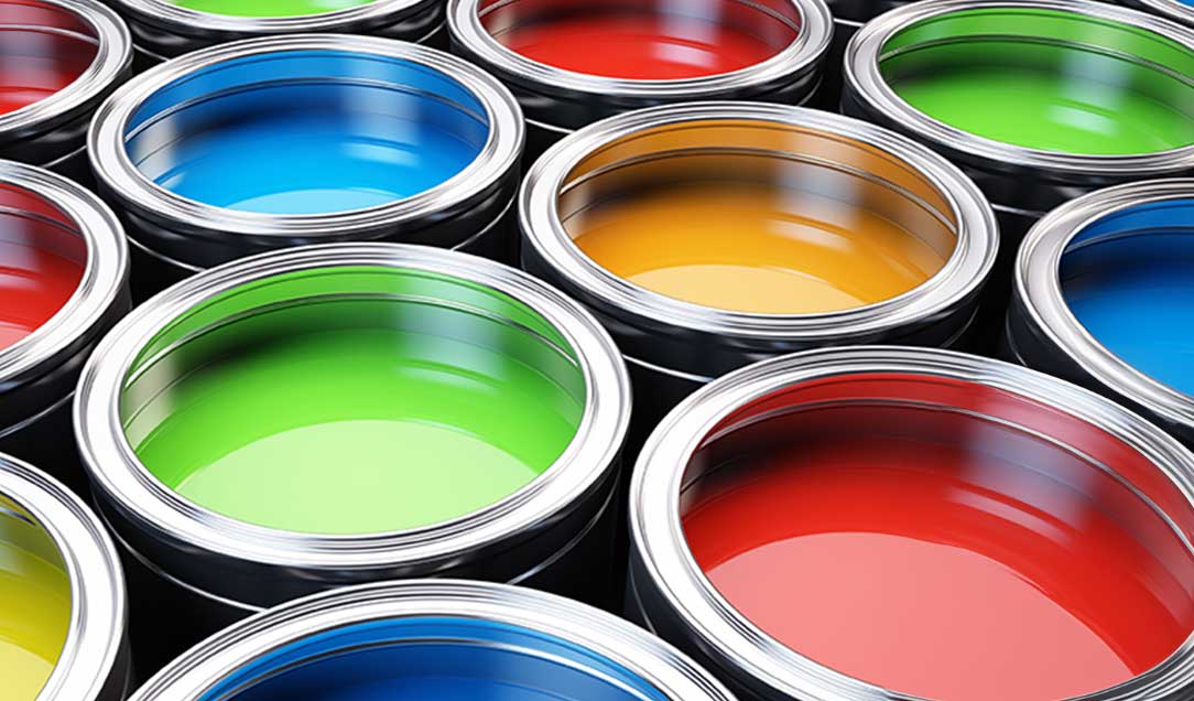 Many paint cans with colored lid.
