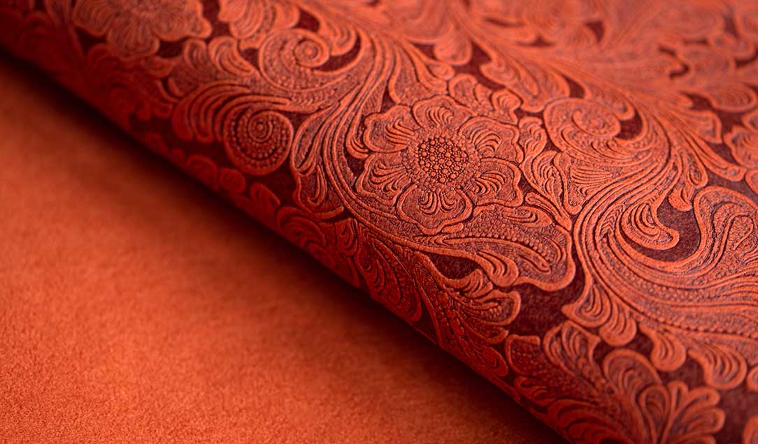 Explore the Versatility and Elegance of Clarino™ Tirrenina™ with Flower Embossing  Discover the exquisite beauty and versatility of our polyester-based man-made leather, now featuring an elegant flower design embossing. Available in a vibrant array of bright colors, this high-quality synthetic material combines durability with an eye-catching appearance, making it ideal for a wide range of applications. Perfect for linings, footwear, decorative purposes, and electronics molding, our embossed man-made leather offers both style and functionality.  The intricate flower embossing adds a unique touch, enhancing the aesthetic appeal of your projects. Whether you're designing fashionable garments, trendy accessories, chic home decor, or sophisticated electronic casings, this versatile material meets all your creative needs. With its extensive palette of vibrant colors and the added charm of embossed patterns, you can create standout pieces that leave a lasting impression. Experience the durability, beauty, and versatility of our polyester-based man-made leather and elevate your designs to the next level.